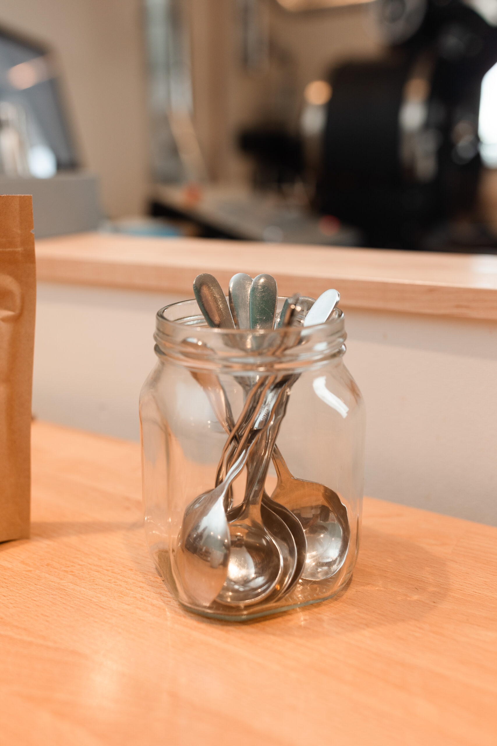 Cupping spoons gathered in a glass jar