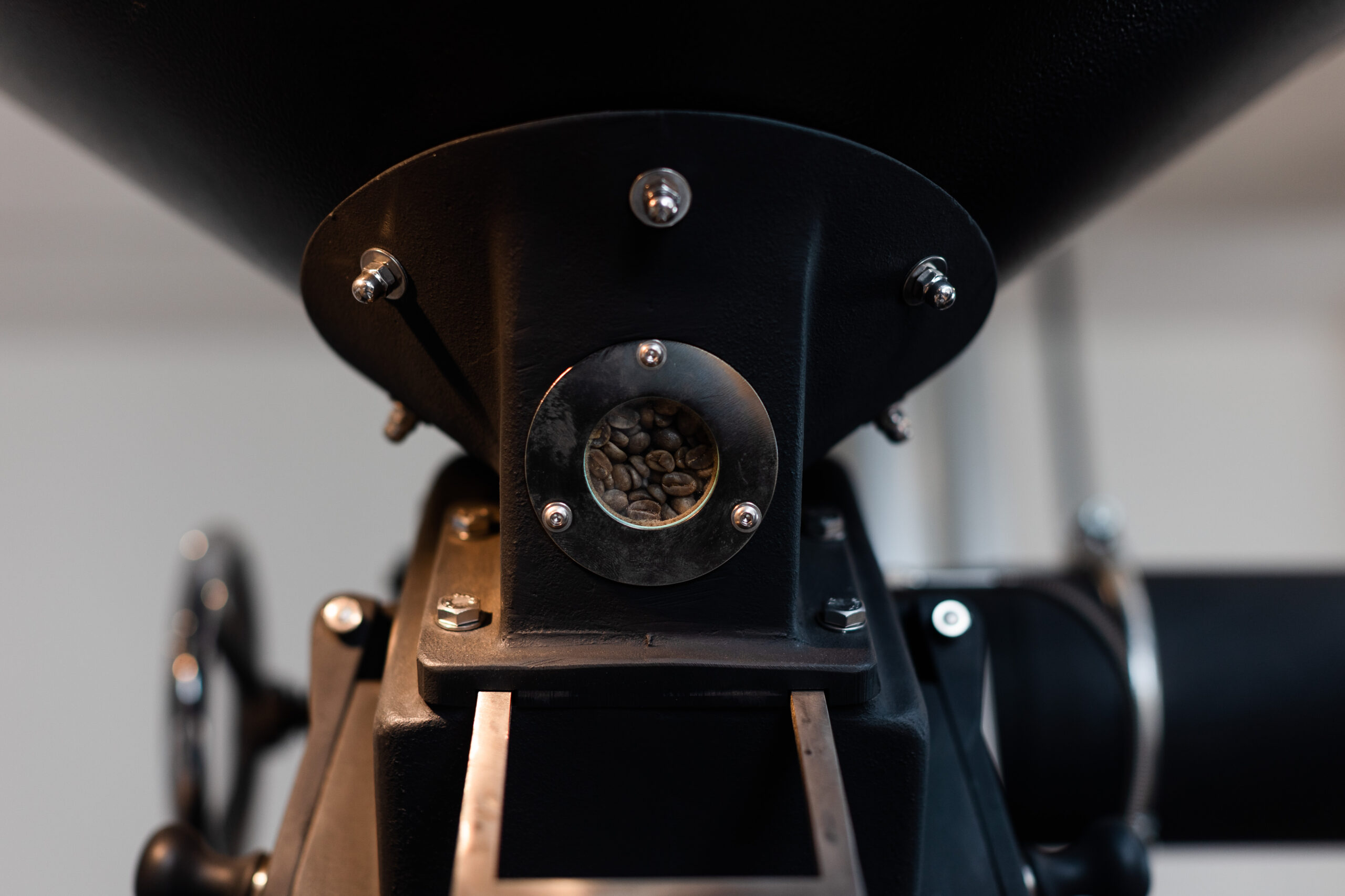 Coffee beans inside of a coffee roaster